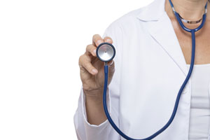 A doctor holding up a stethoscope